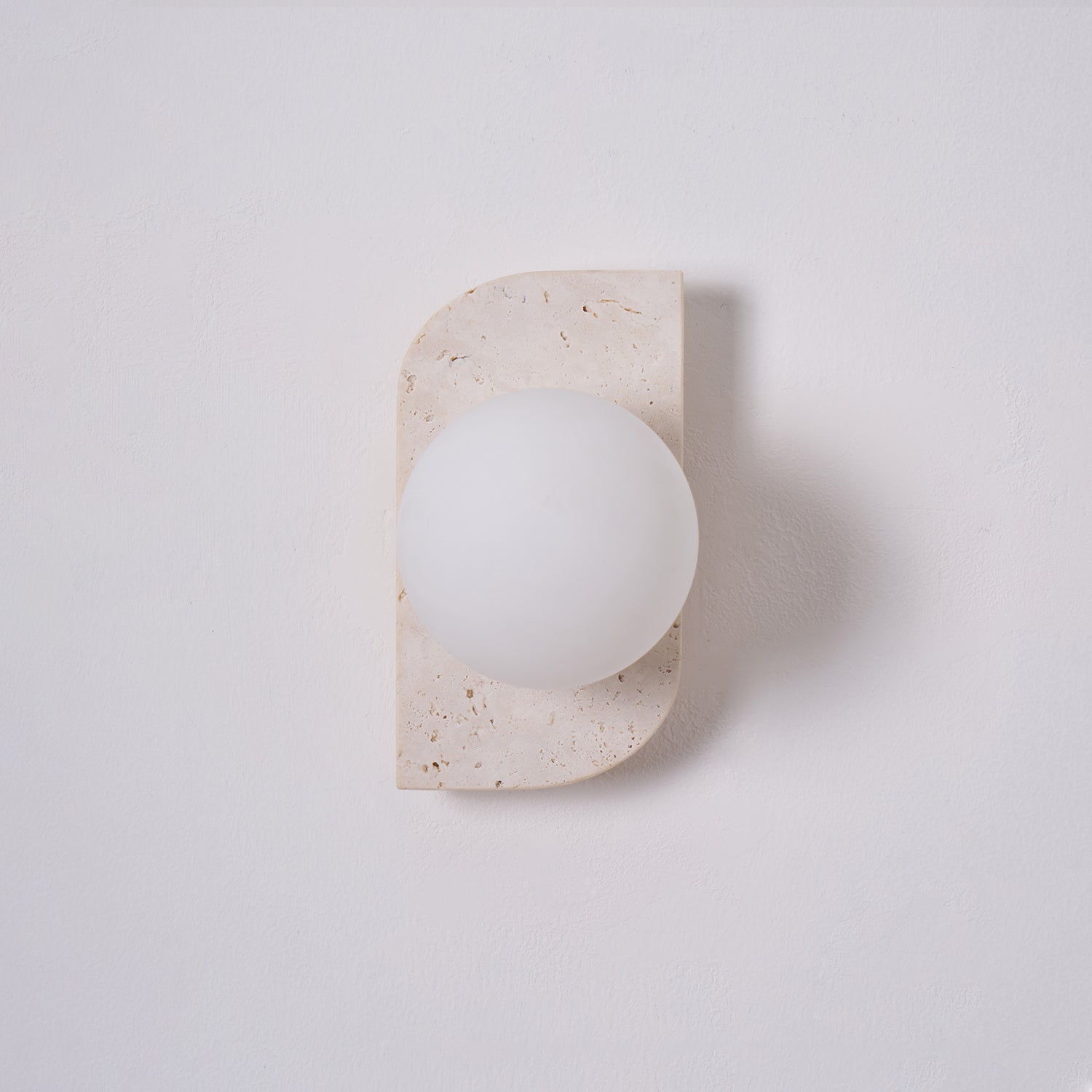 Zophaor Minimalist Travertine Plug-In Wall Light - Neutralighting
