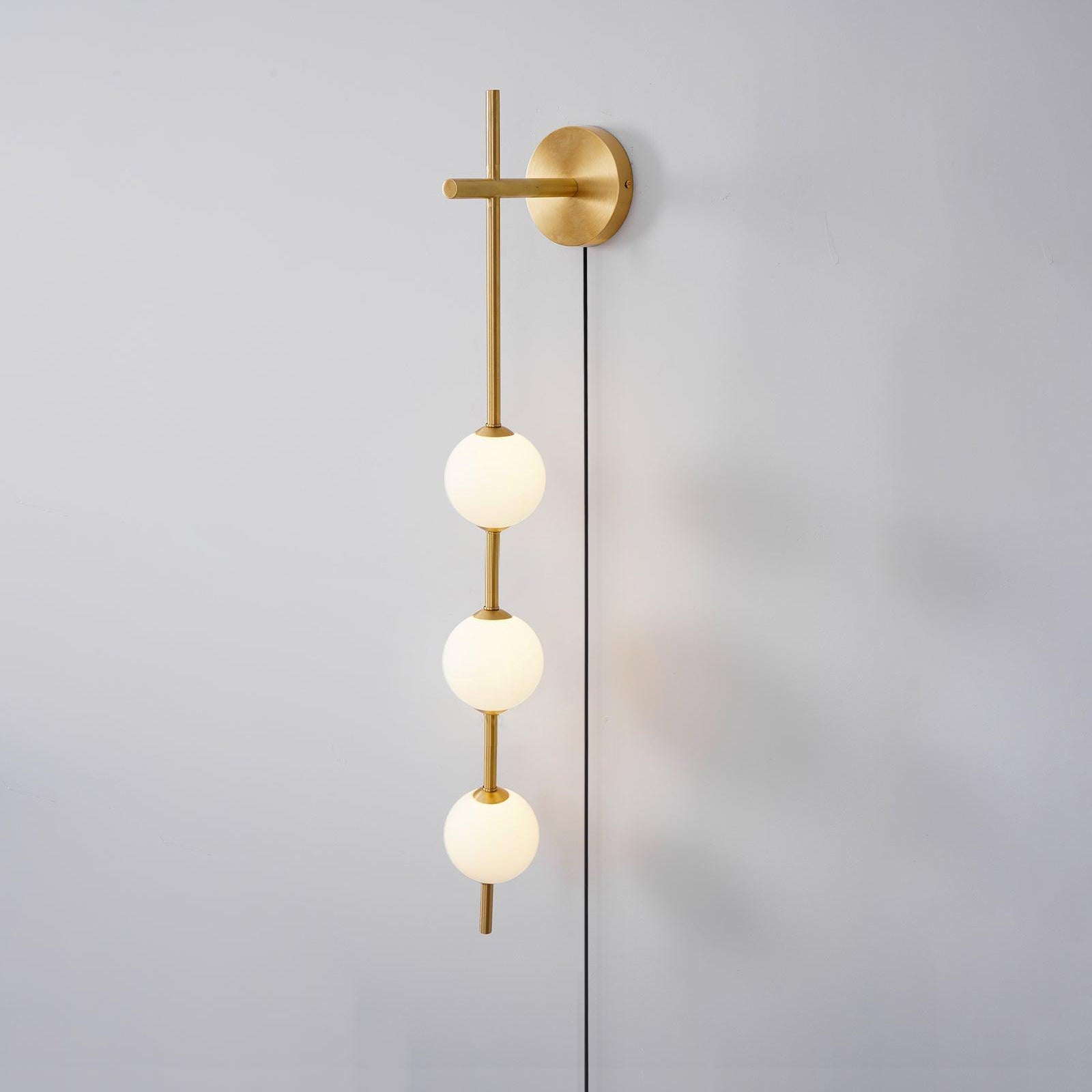 Ilraeia Vertical Globe Plug-in Wall Lamp - Neutralighting