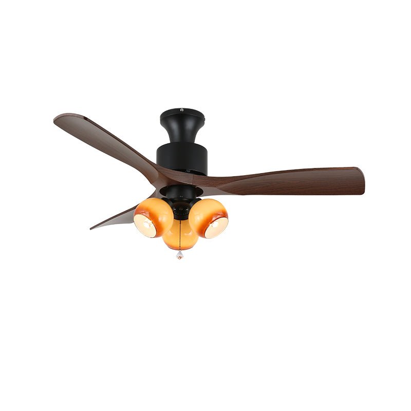 Gros plan de l'abat-jour en verre du ventilateur de plafond Veloria Vintage