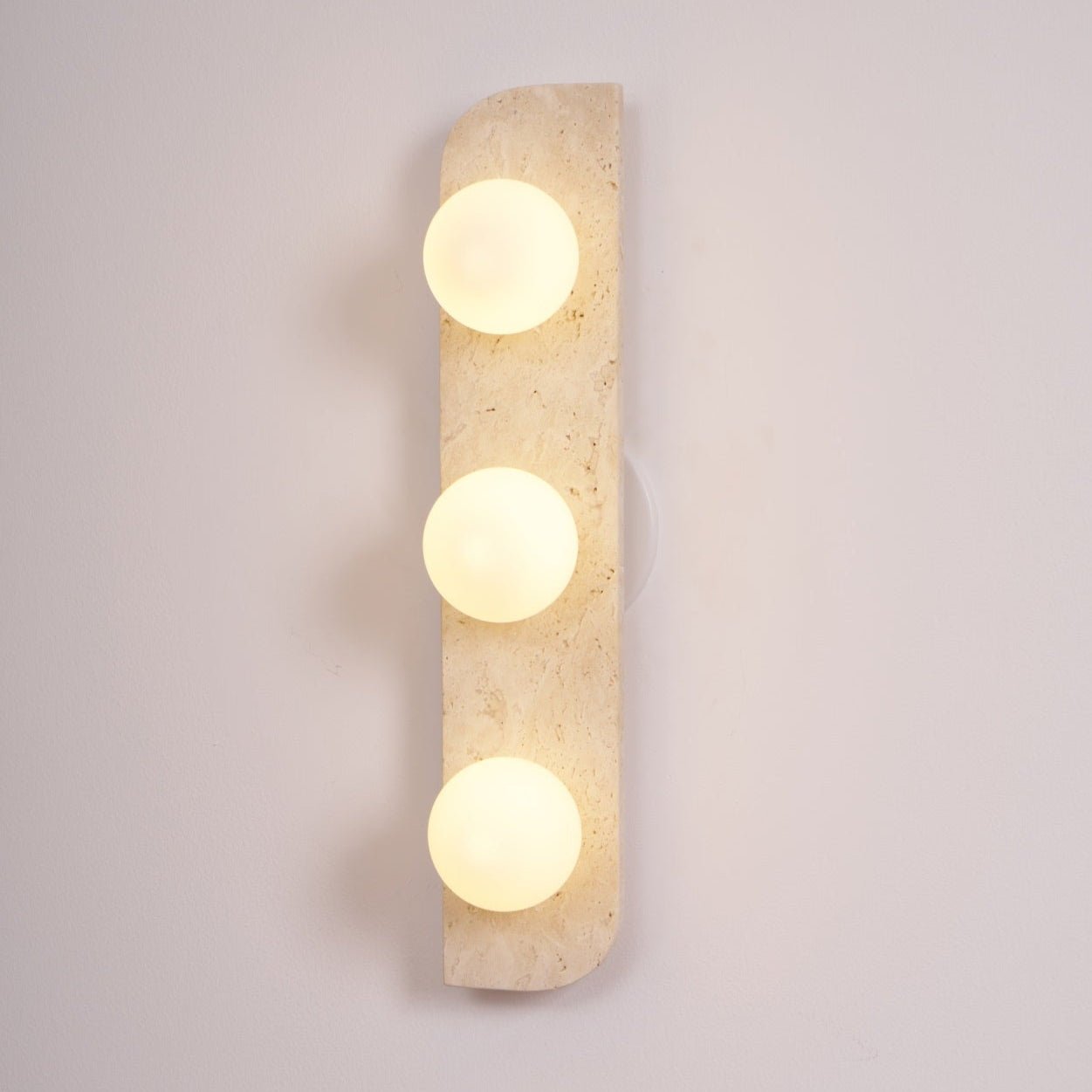 Zophaor Minimalist Travertine Plug-In Wall Light - Neutralighting