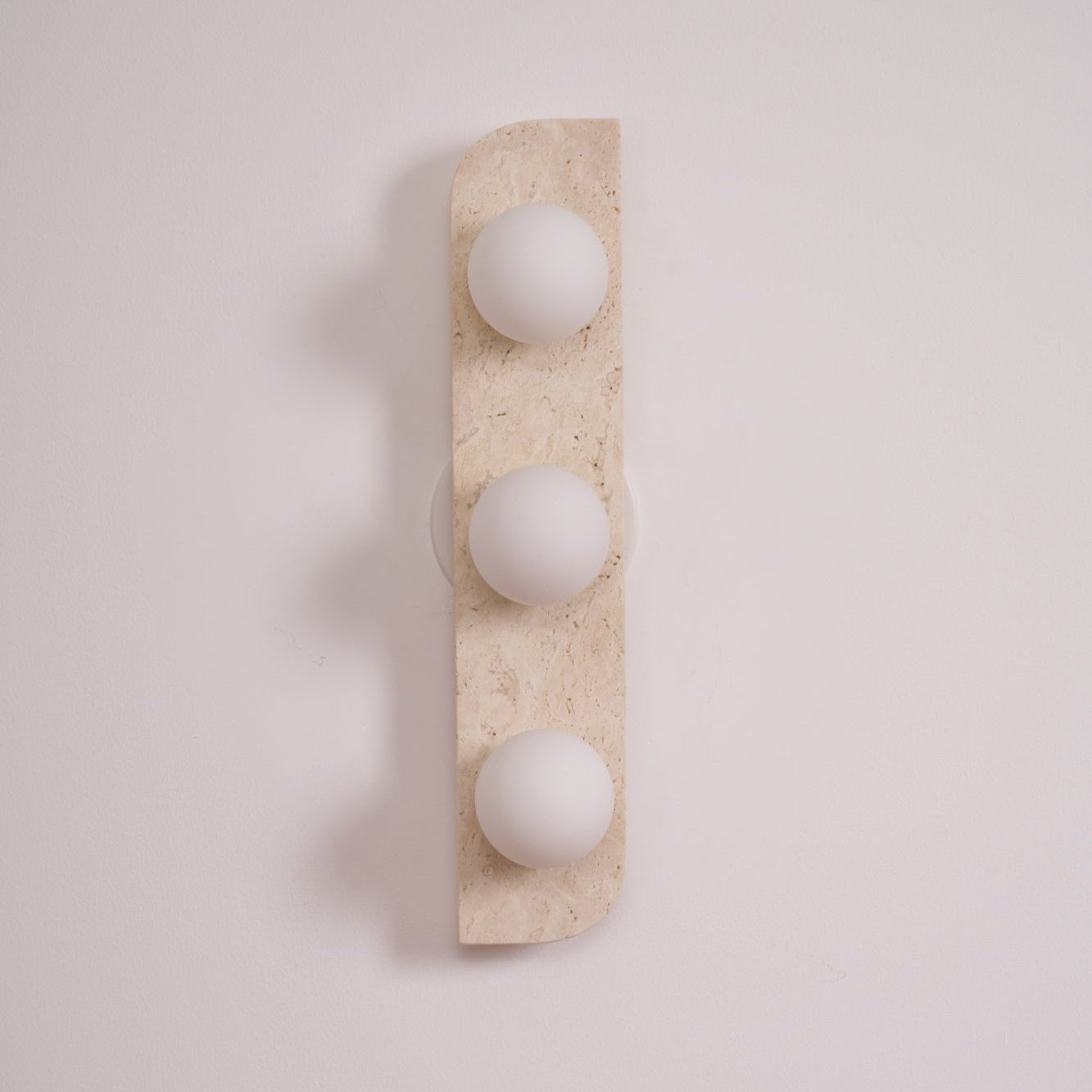 Zophaor Minimalist Travertine Plug-In Wall Light - Neutralighting