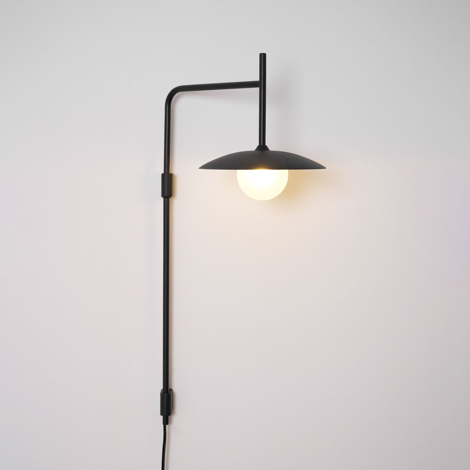 Edan Swing Arm Plug-in Glass Wall Lamp - Neutralighting