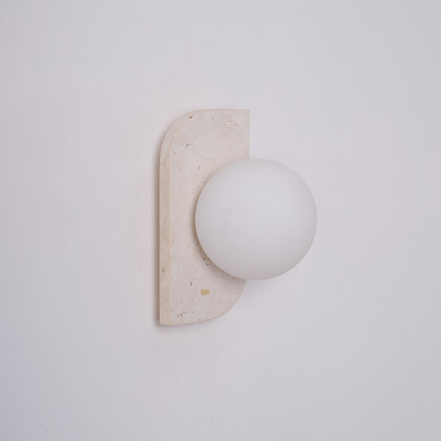 Zophaor Minimalist Travertine Plug-In Wall Light - Neutralighting