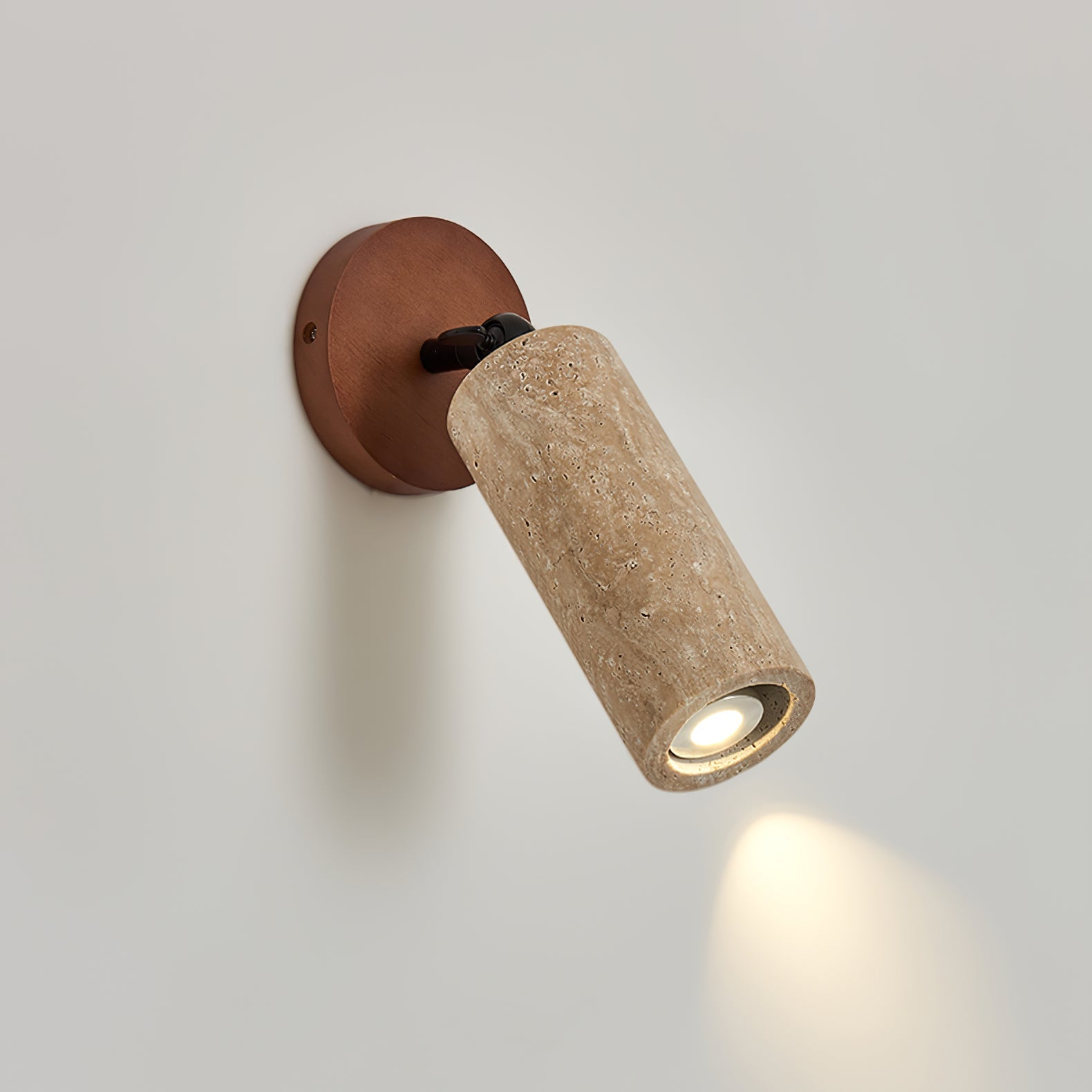 Cesilyra Swivel Cylinder Travertine Wall Light - Neutralighting