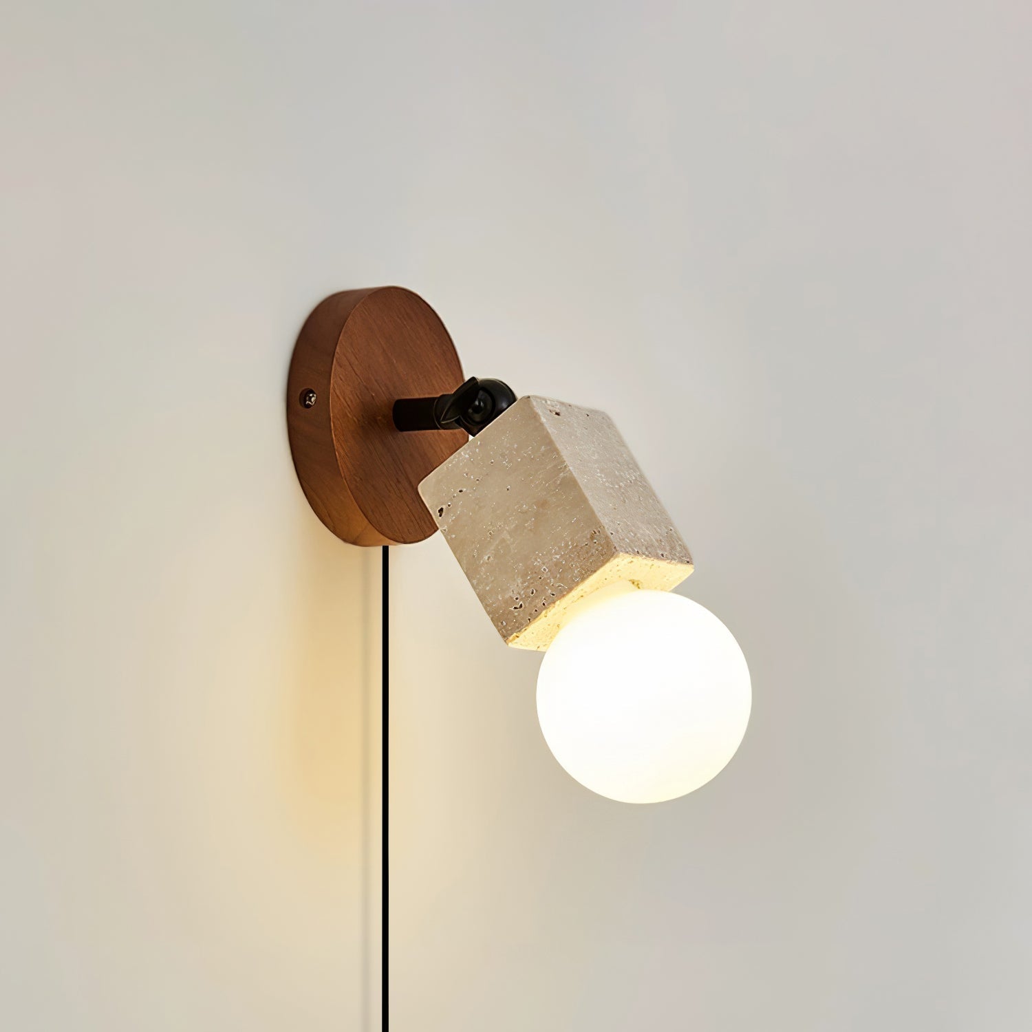 Cesilyra Swivel Cylinder Travertine Wall Light - Neutralighting